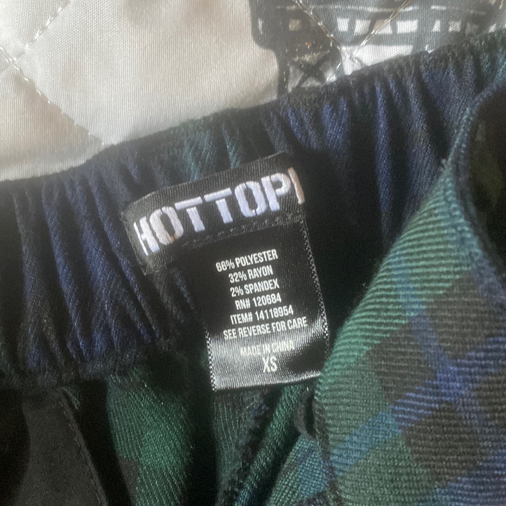 green and black striped pants